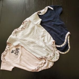 Set of three Laura Ashely baby onesies
